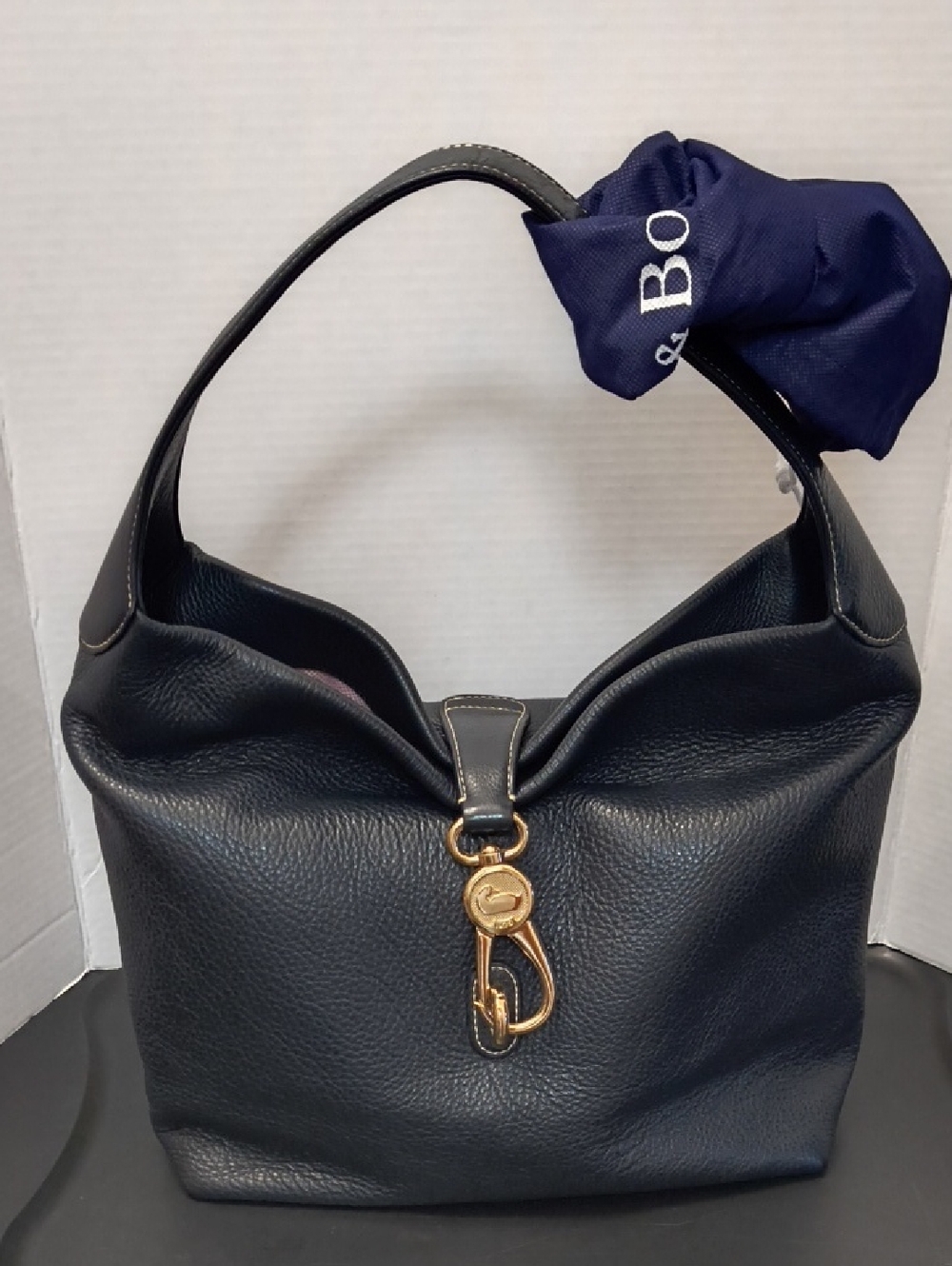 Vintage Dooney & Bourke Navy Pebbled Leather Logo Lock Hobo with Gold Hardware